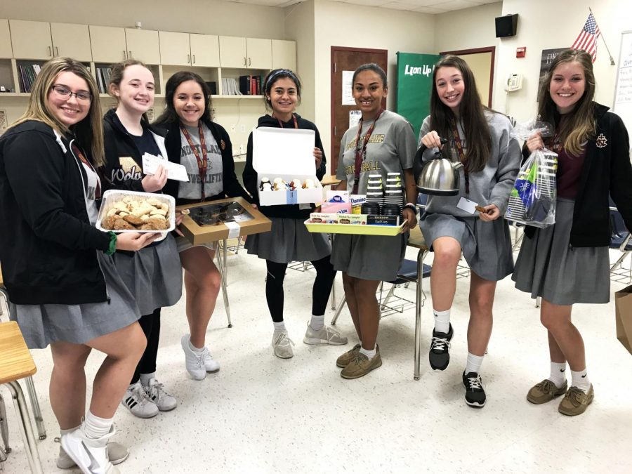 One sophomore girls Advisory Group baked treats and brought tea selections to faculty and teachers on campus as one service opportunity during Service Week. They are one of many groups who participated in Service Week through creative activities such as painting, cleaning, and more around campus.