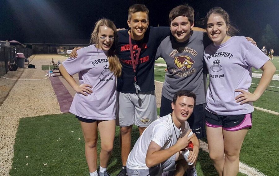 Taylor Bourgeois (third) attends a Powder Puff game his junior year with friends Morgan Marullo, Josh Holloway, Abigail McLain and Tyler Mussachia.
