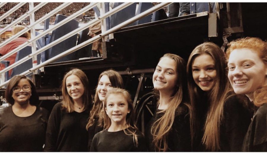 Northlakes Vocal Ensemble before singing the National Anthem at a Pelicans game in the fall.